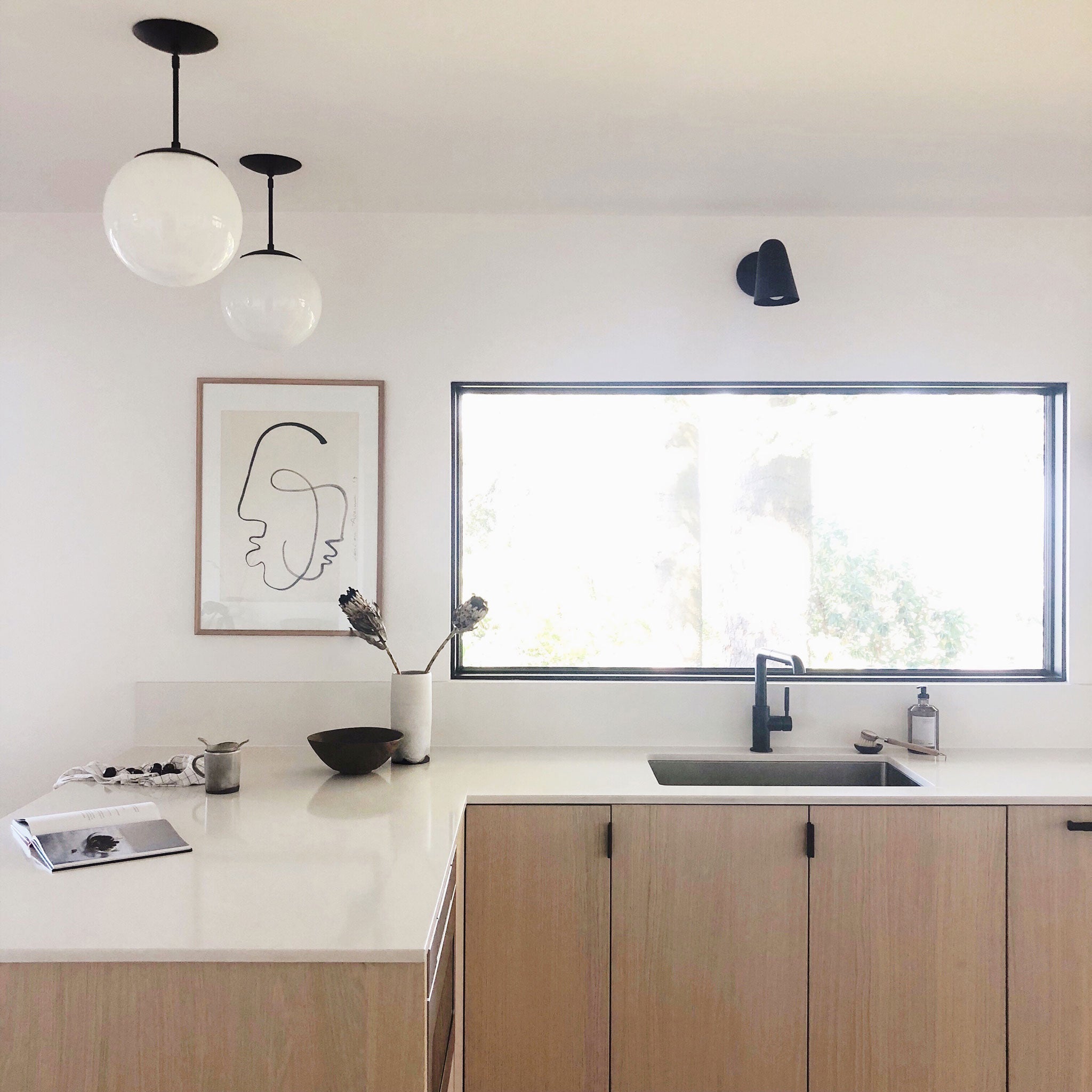 Wildwood shown in Matte Black. Interior Design by Courtney Nye Design