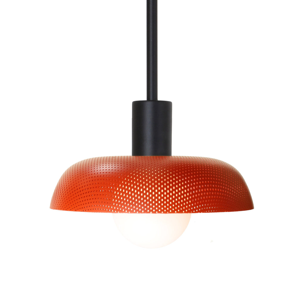 Sally Pendant for Vaulted Ceiling shown with a Persimmon perforated shade and Matte Black fixture finish.