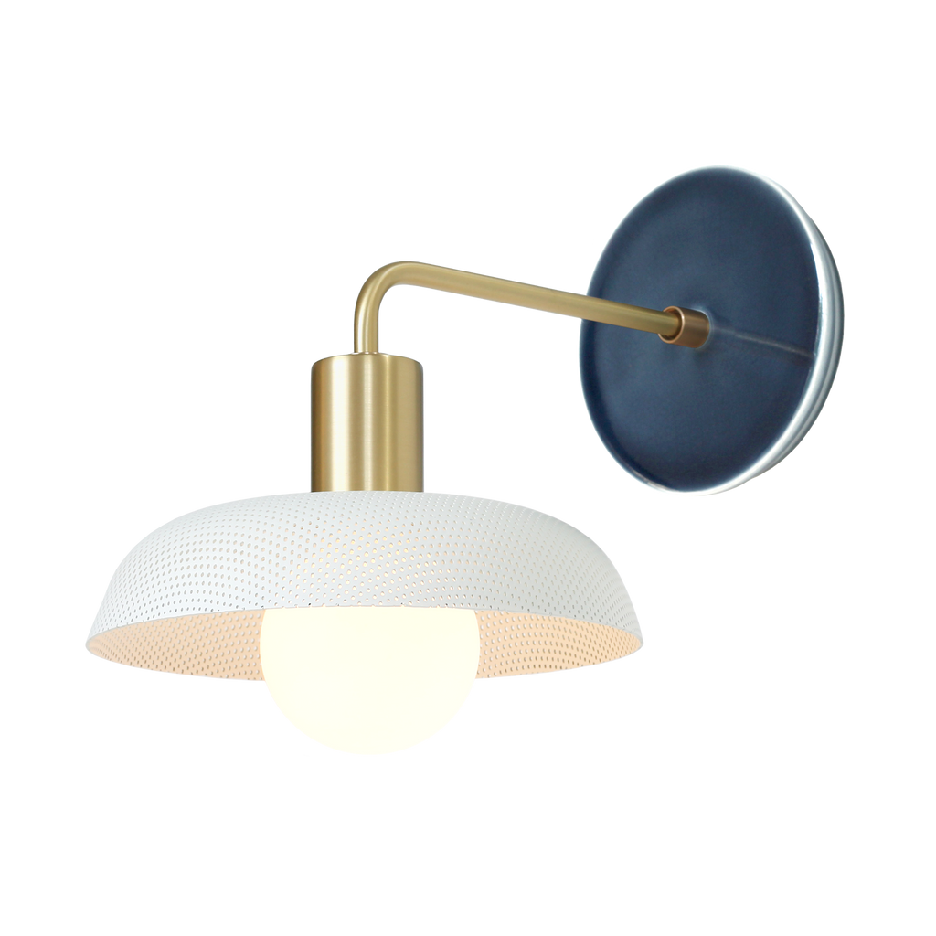 Sally Sconce shown with White perforated shade, Brass accent finish, and Indigo Blue Swift ceramic canopy.
