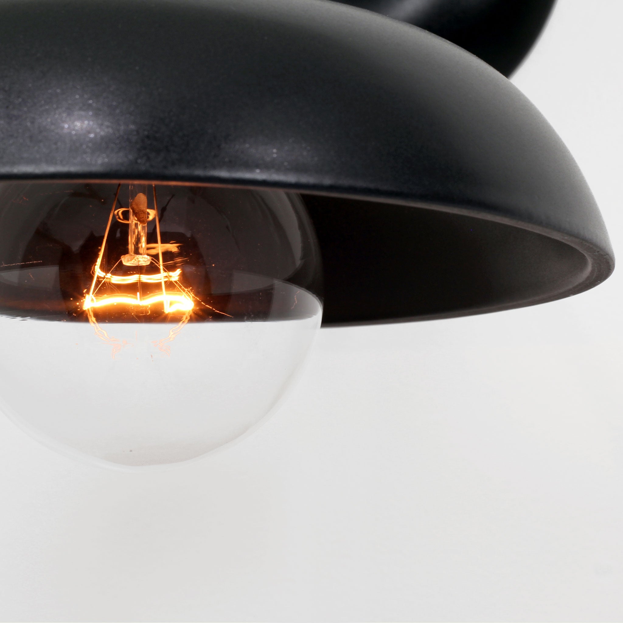 Terra Sconce shown in Eclipse Black Glaze ceramic finish with Matte Black metal