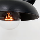 Cedar and Moss. Terra Sconce. Eclipse Black ceramic glaze (G25 light bulb shown, not included)