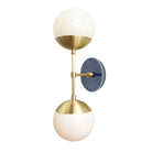 Theo 6" with Ceramic Canopy shown in Brass with an Indigo Blue Swift pattern canopy