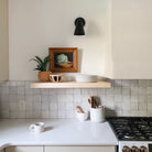 Tilt Cone shown in Matte Black finish with 3" arm. Interior design by Alyssia Moore