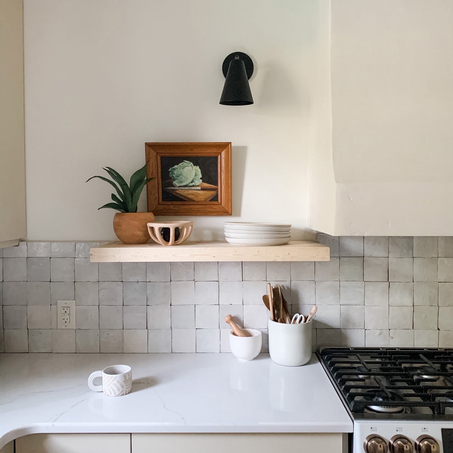 Tilt Cone shown in Matte Black finish with 3" arm. Interior design by Alyssia Moore