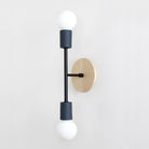 Verona shown in Denim ceramic finish with Matte Black metal and Maple canopy