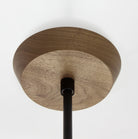 Mounting canopy shown in Walnut with Matte Black rod