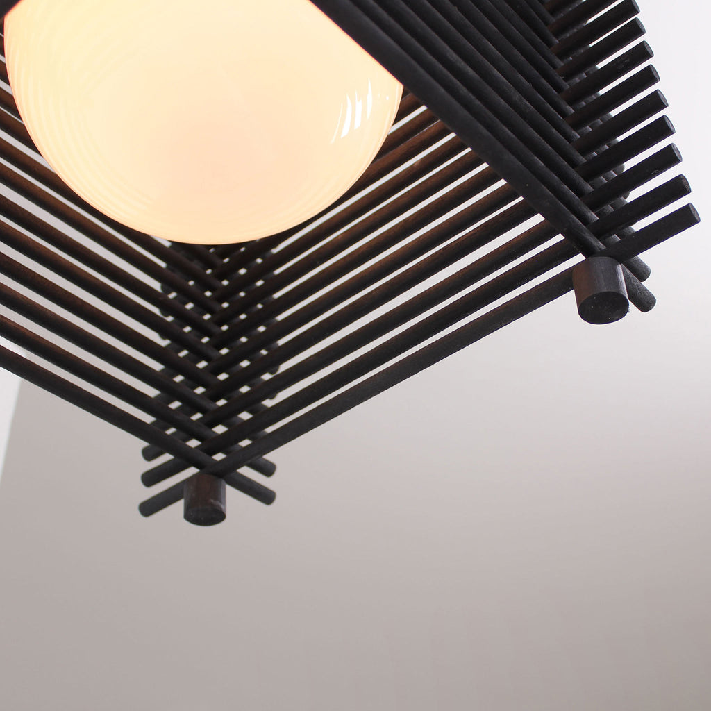 Yugen Pendant shown in Black Stained wood.