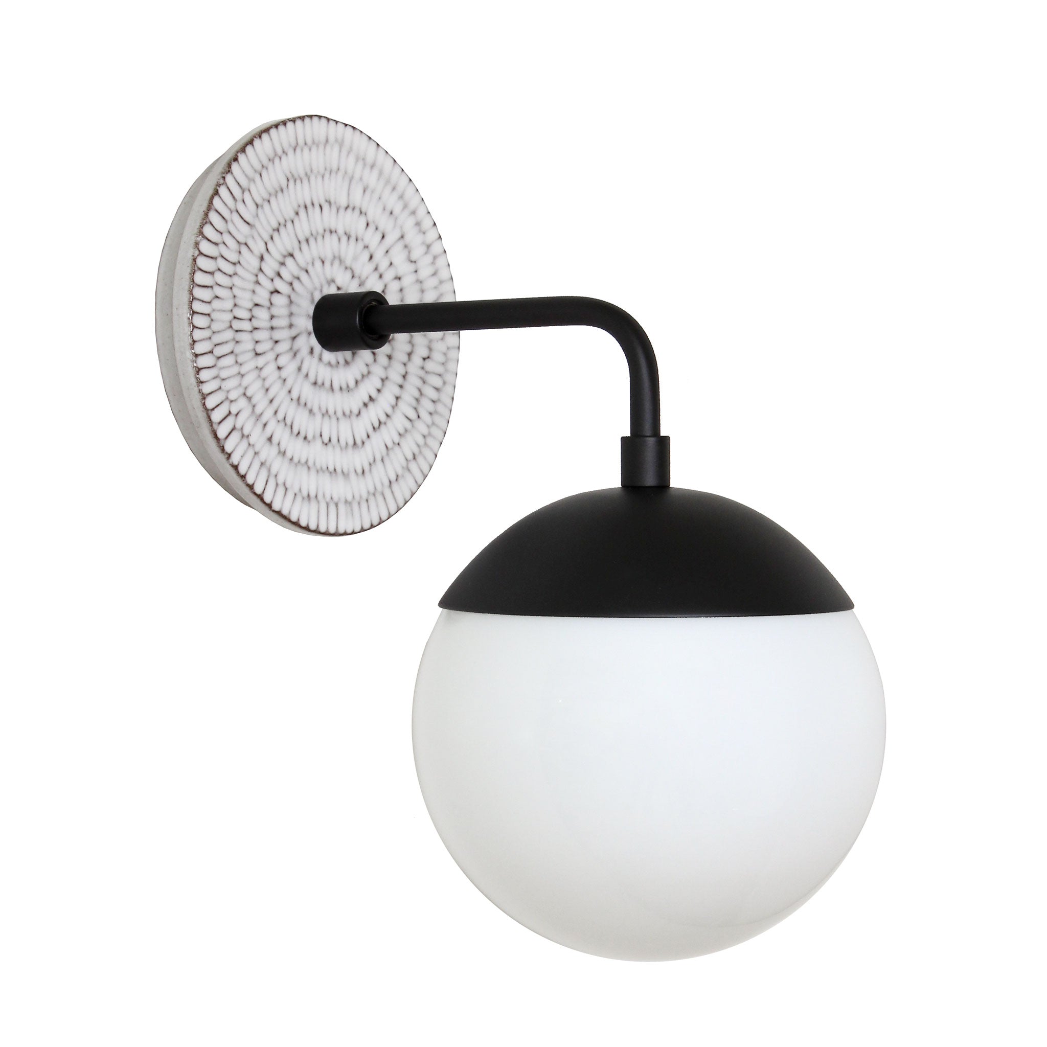 Alto Sconce 6" with Ceramic Canopy shown in Matte Black with a Brownstone White Sunflower Canopy Pattern and an Opal 6" globe