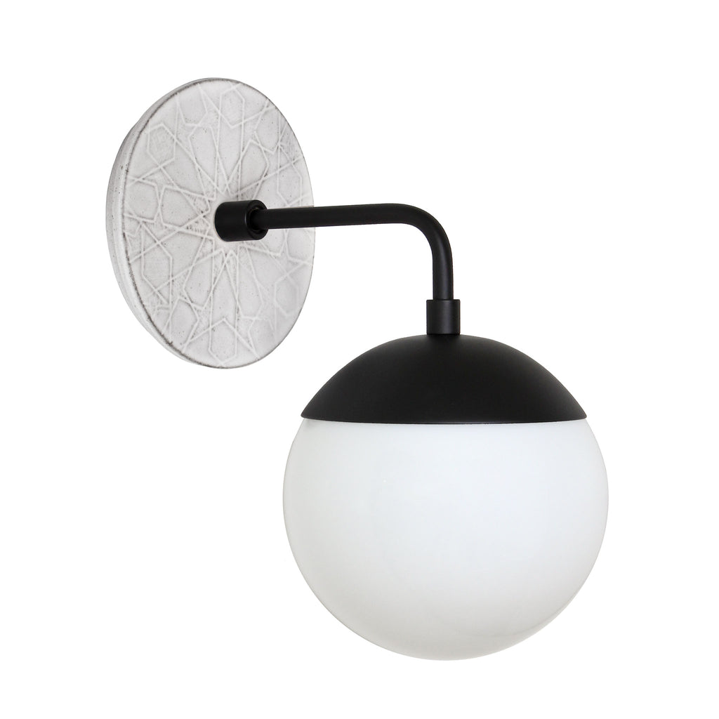 Alto Sconce 6" with Ceramic Canopy shown in Matte Black with a Brownstone White Star Ceramic Canopy Patttern and an Opal 6" globe.