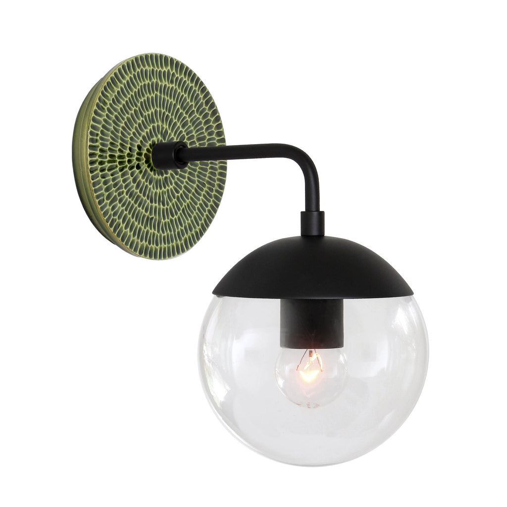 Alto Sconce 6" with Ceramic Canopy shown in Matte Black with a Forest Green Sunflower Ceramic Canopy Pattern and a Clear 6" globe.