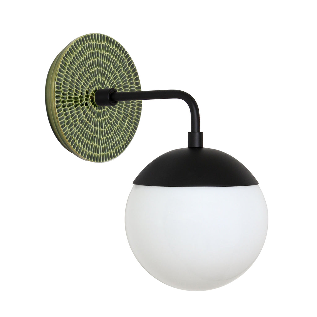 Alto Sconce 6" with Ceramic Canopy shown in Matte Black with a Forest Green Sunflower Ceramic Canopy Pattern and an Opal 6" globe.