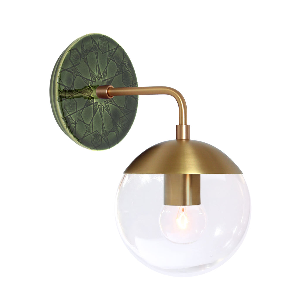 Alto Sconce 6" with Ceramic Canopy shown in Brass with a Forest Green Star Ceramic Canopy Pattern and a Clear 6" globe.