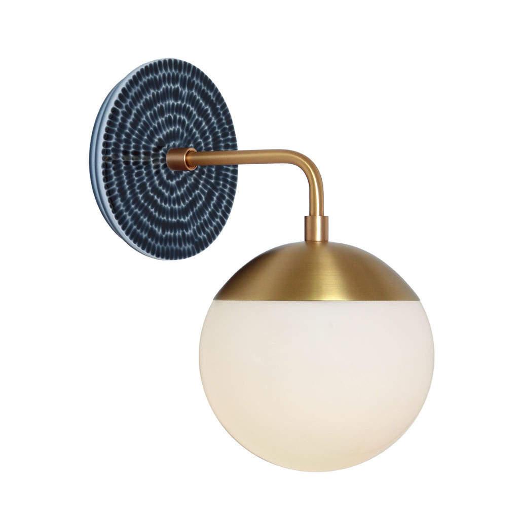Alto Sconce 6" with Ceramic Canopy shown in Brass with an Indigo Blue Sunflower Ceramic Canopy Pattern and an Opal 6" globe.