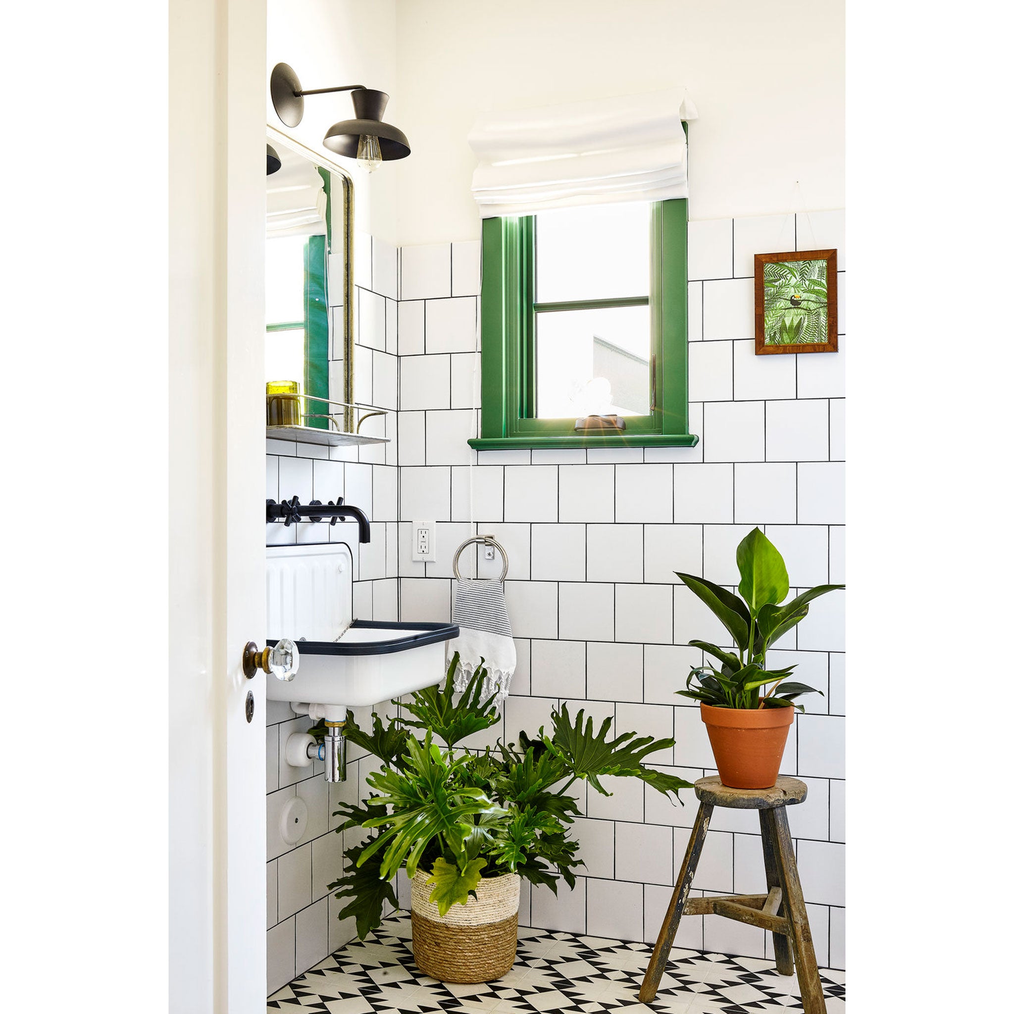  Isle Sconce shown in Matte Black. Interior Design by byrdesign. Photo by Heidi's Bridge