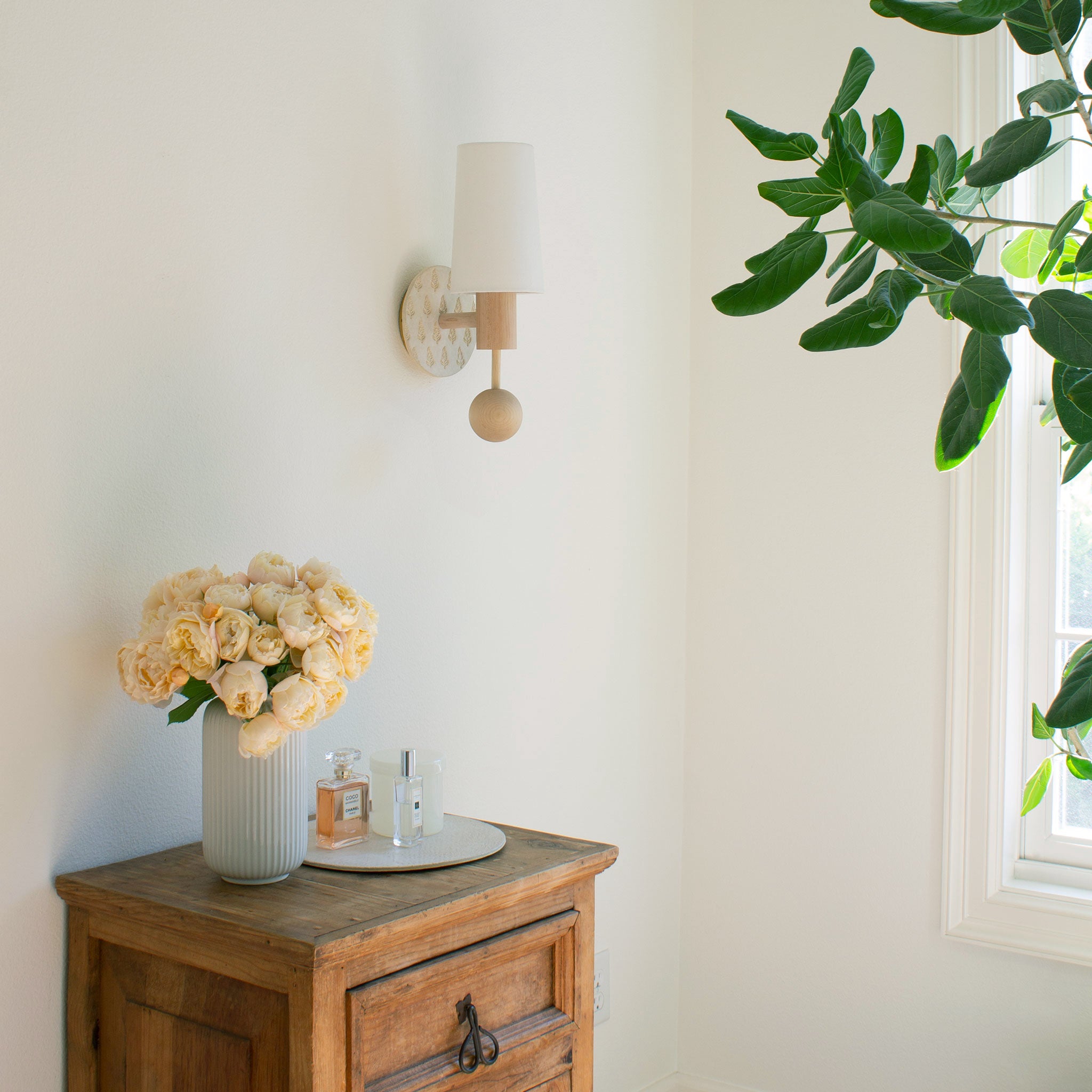 Amherst sconce shown in Maple with Natural White and Cream Floral Ceramic