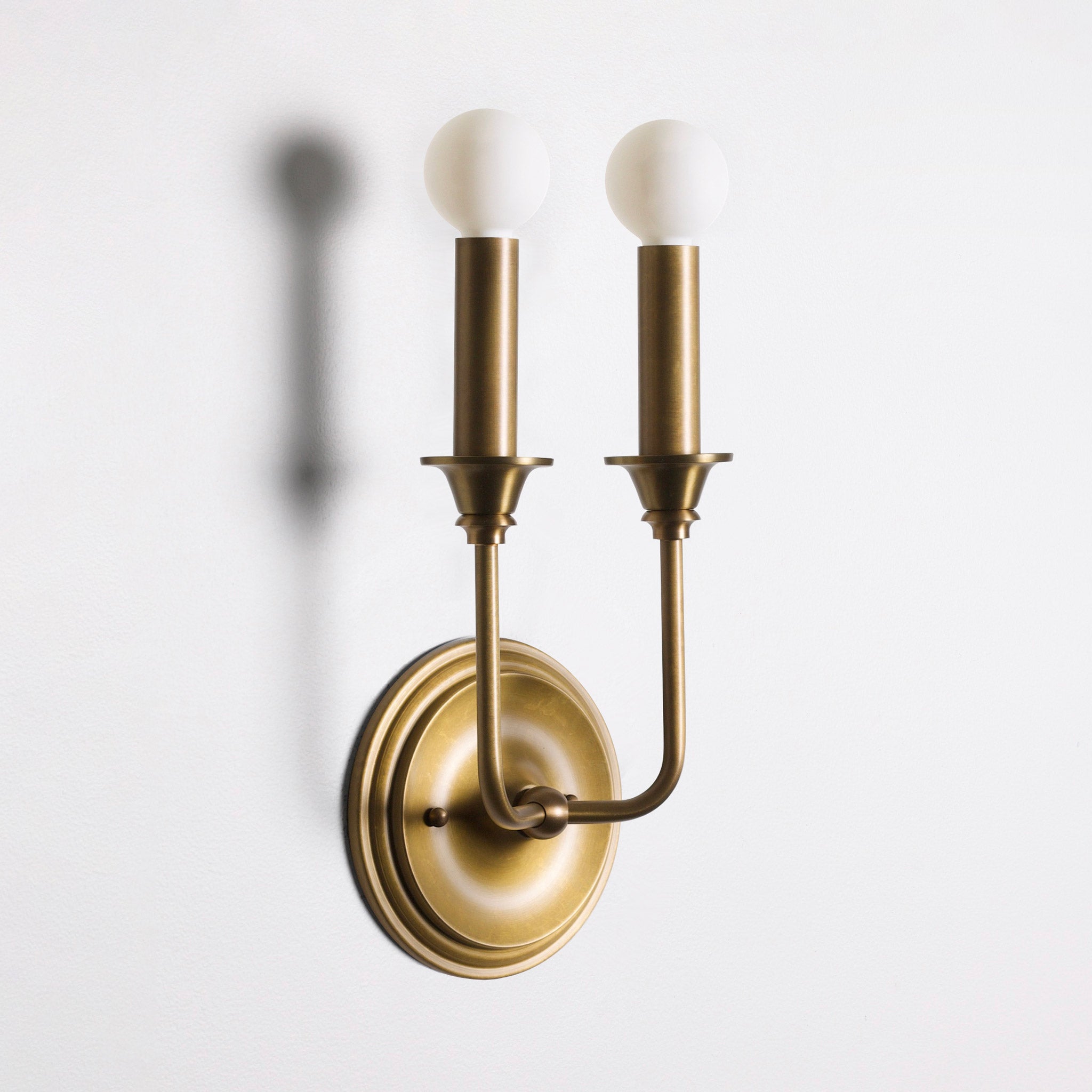 Bijou Double Candle shown in Heirloom Brass