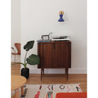 Bobbie Sconce shown in Cobalt Blue Glaze with Matte Black Metal and Maple Canopy