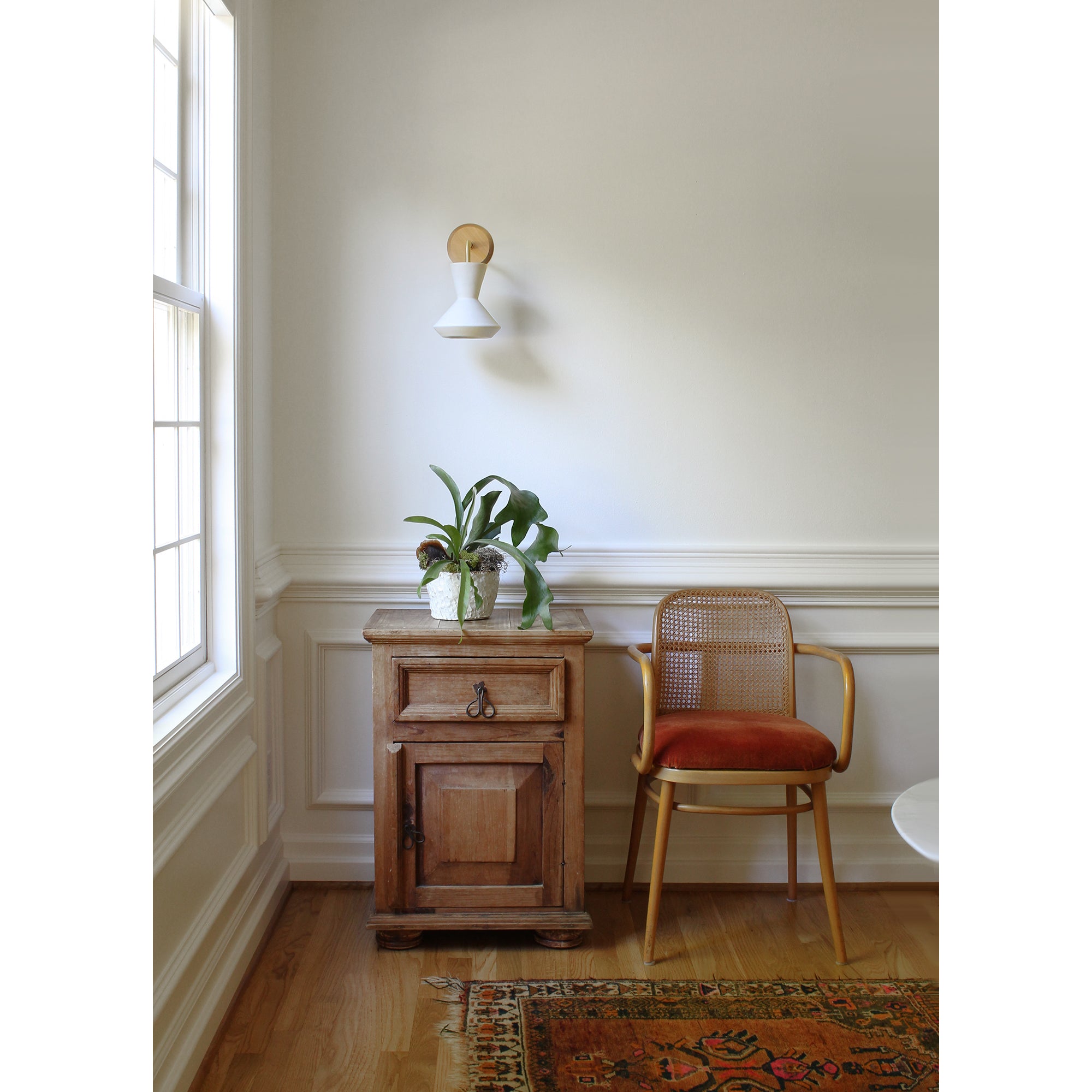 Bobbie Sconce shown in Natural White Glaze with Brass Metal and Maple Canopy