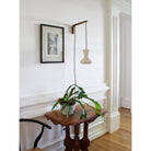 Bobbie Swing shown in Natural White Glaze with Walnut wood and Black Twist cord