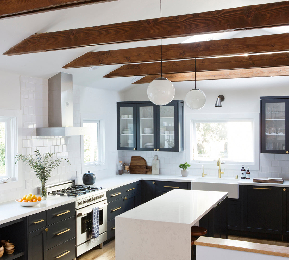 Tilt Cone shown in Graphite Patina with Brass. Interior design by Carly Waters. Photo by Vivian Johnson