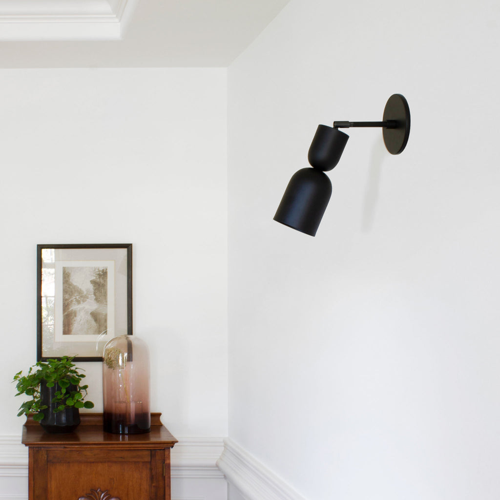 Chance Sconce shown in Matte Black with a 3" arm length.