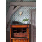 Edith ADA Sconce shown in Heirloom Brass with Natural White and Cream Floral Ceramic