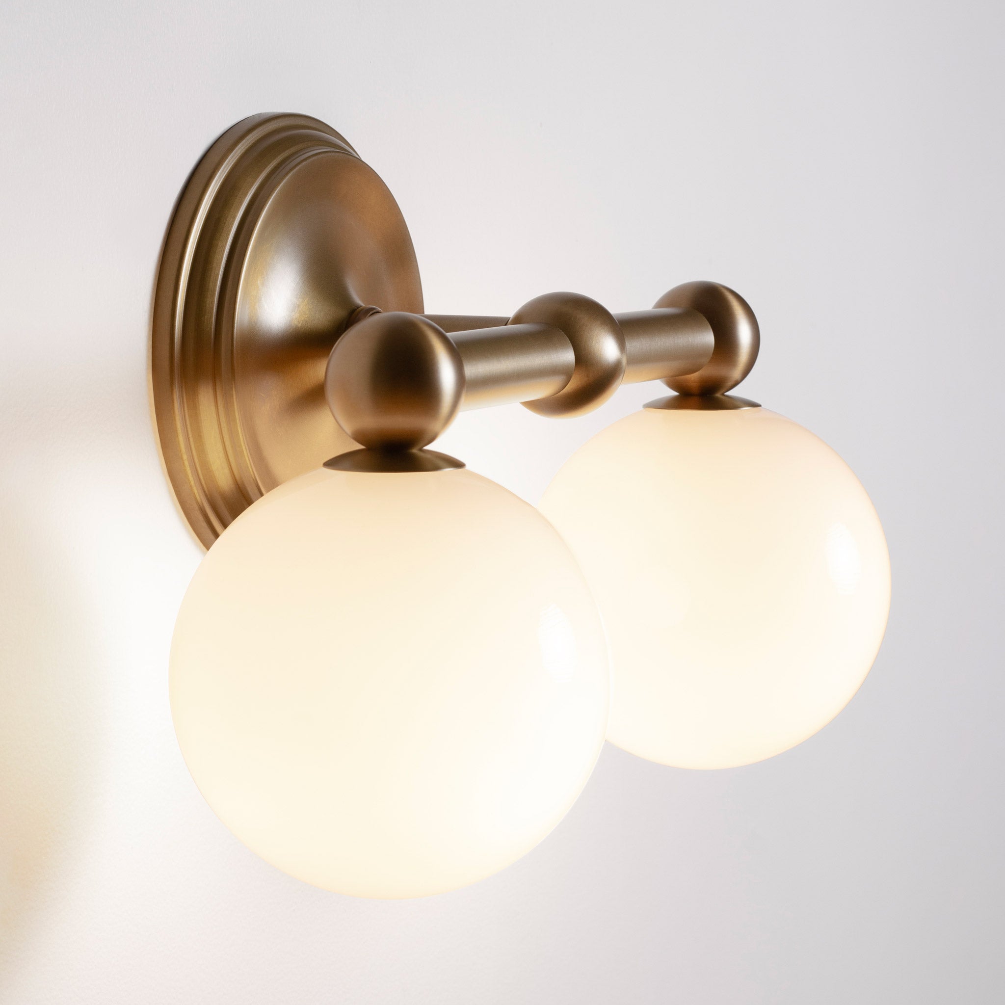 Eleanor Double Sconce shown in Heirloom Brass