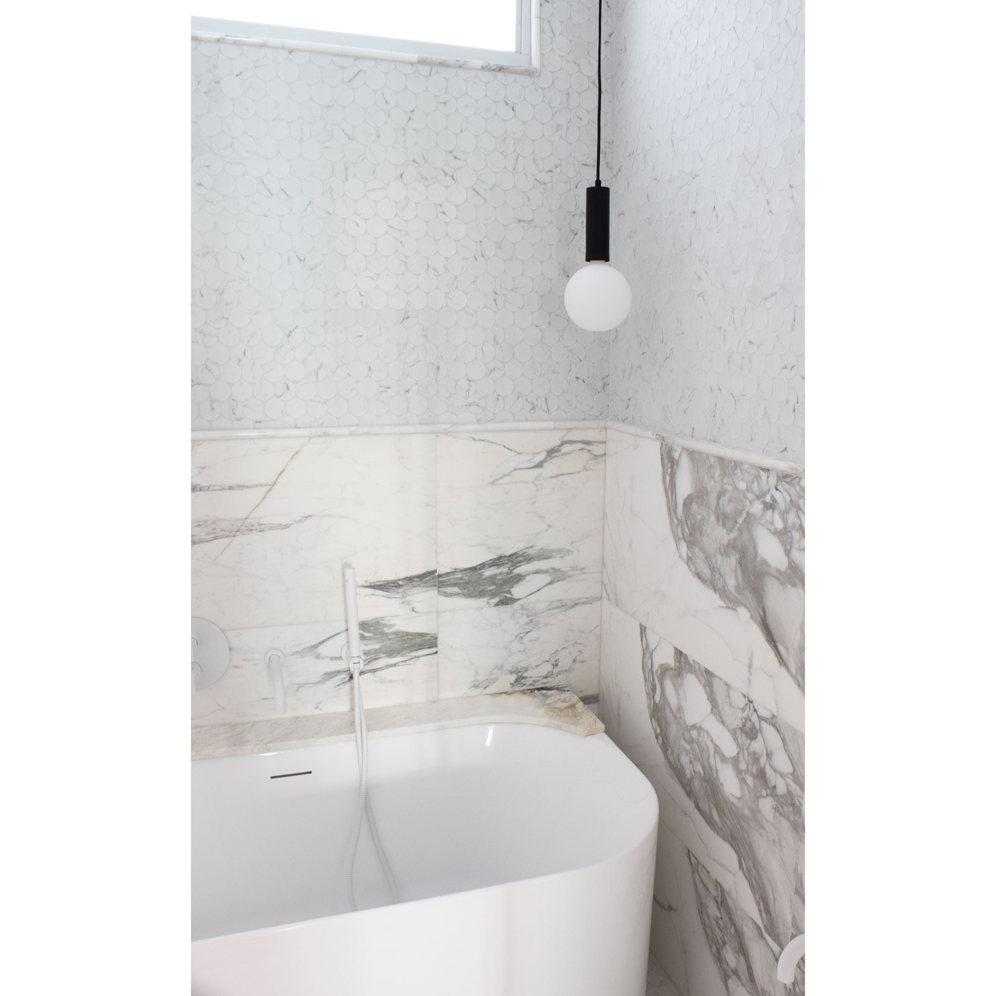 Fjord Cord Pendant shown in Matte Black with Black Cloth Cord