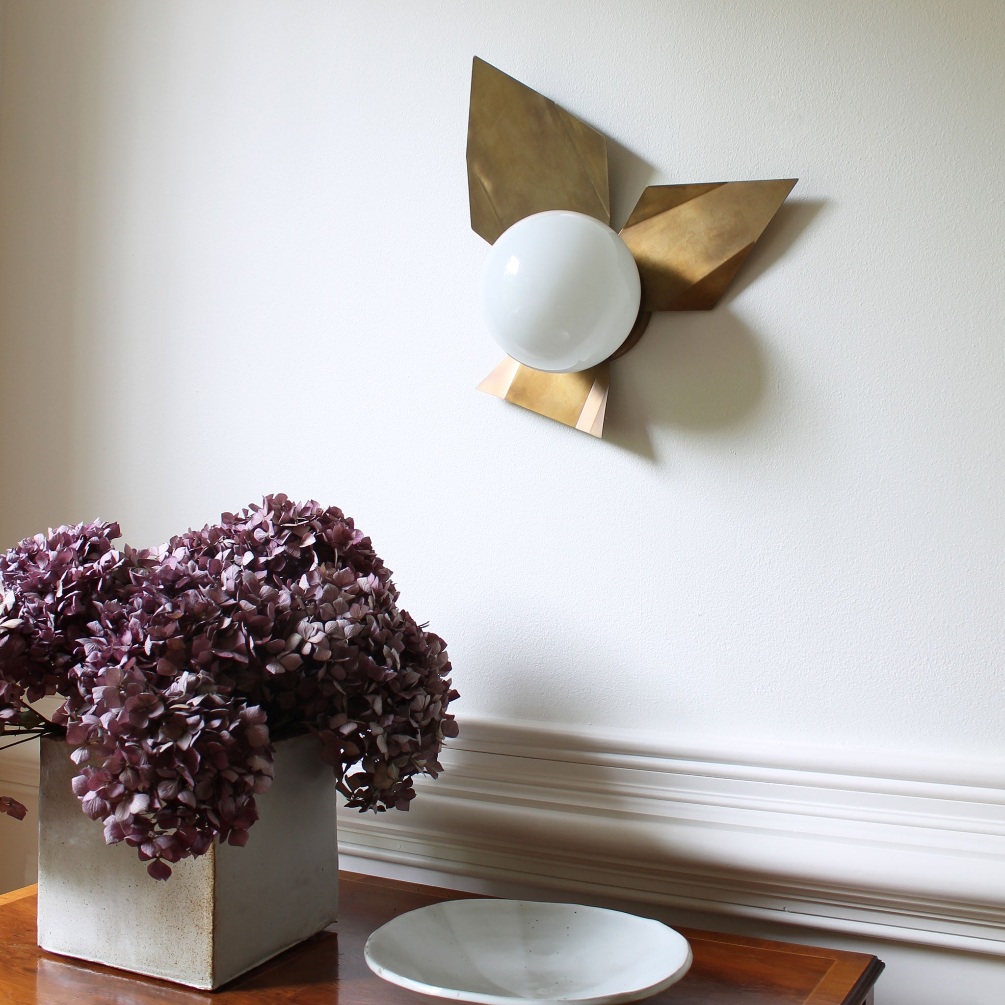Florence sconce shown in Heirloom Brass