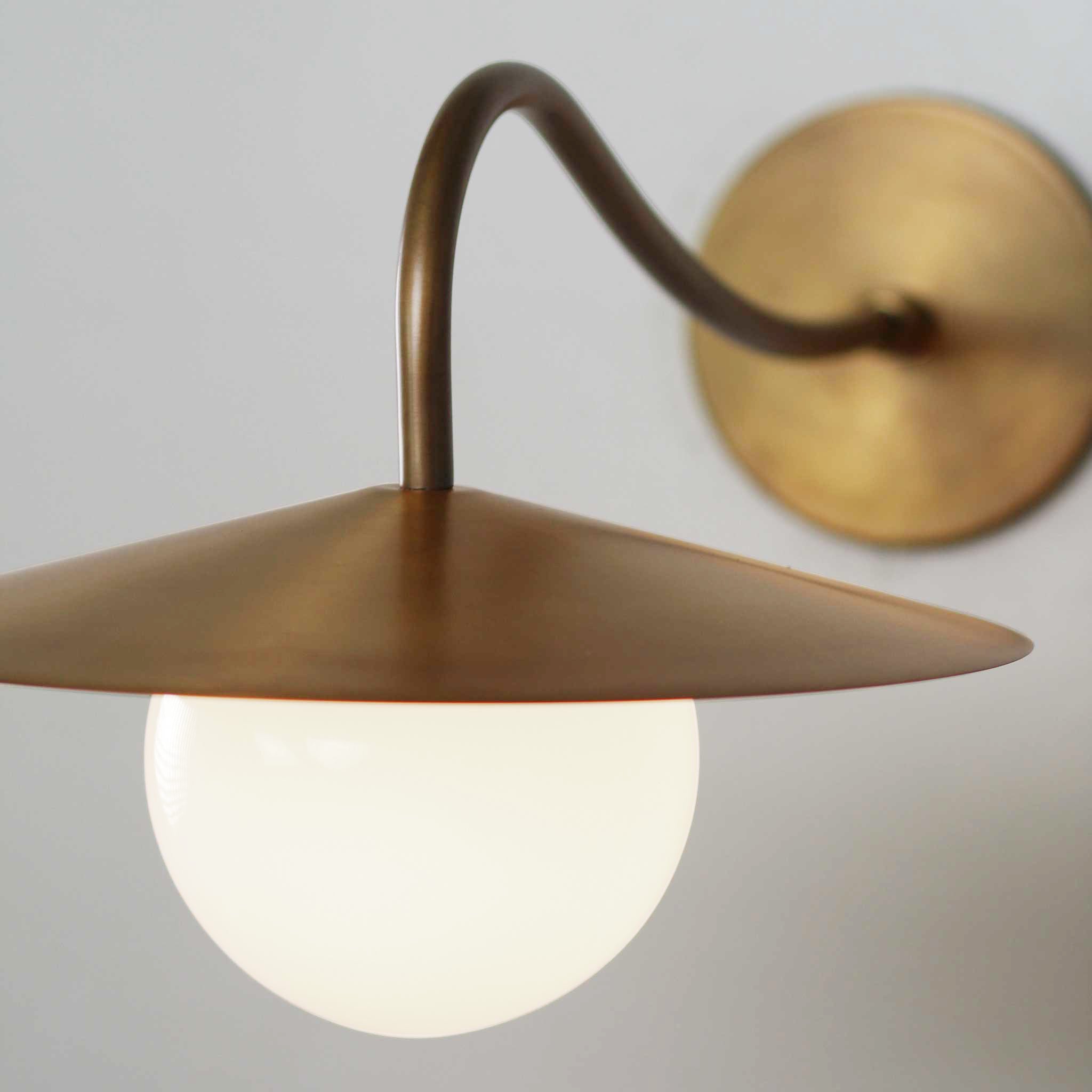 Marie Sconce shown in Heirloom Brass