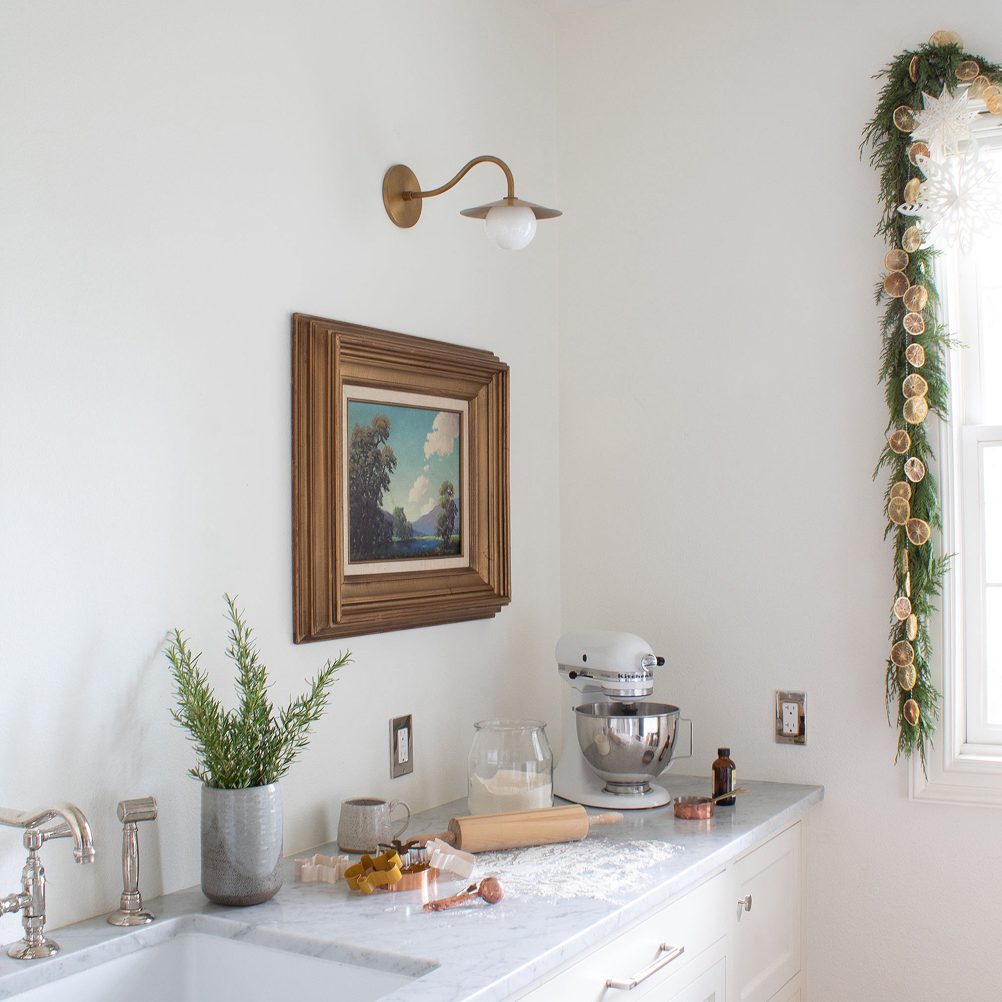 Marie Petite Sconce shown in Heirloom Brass