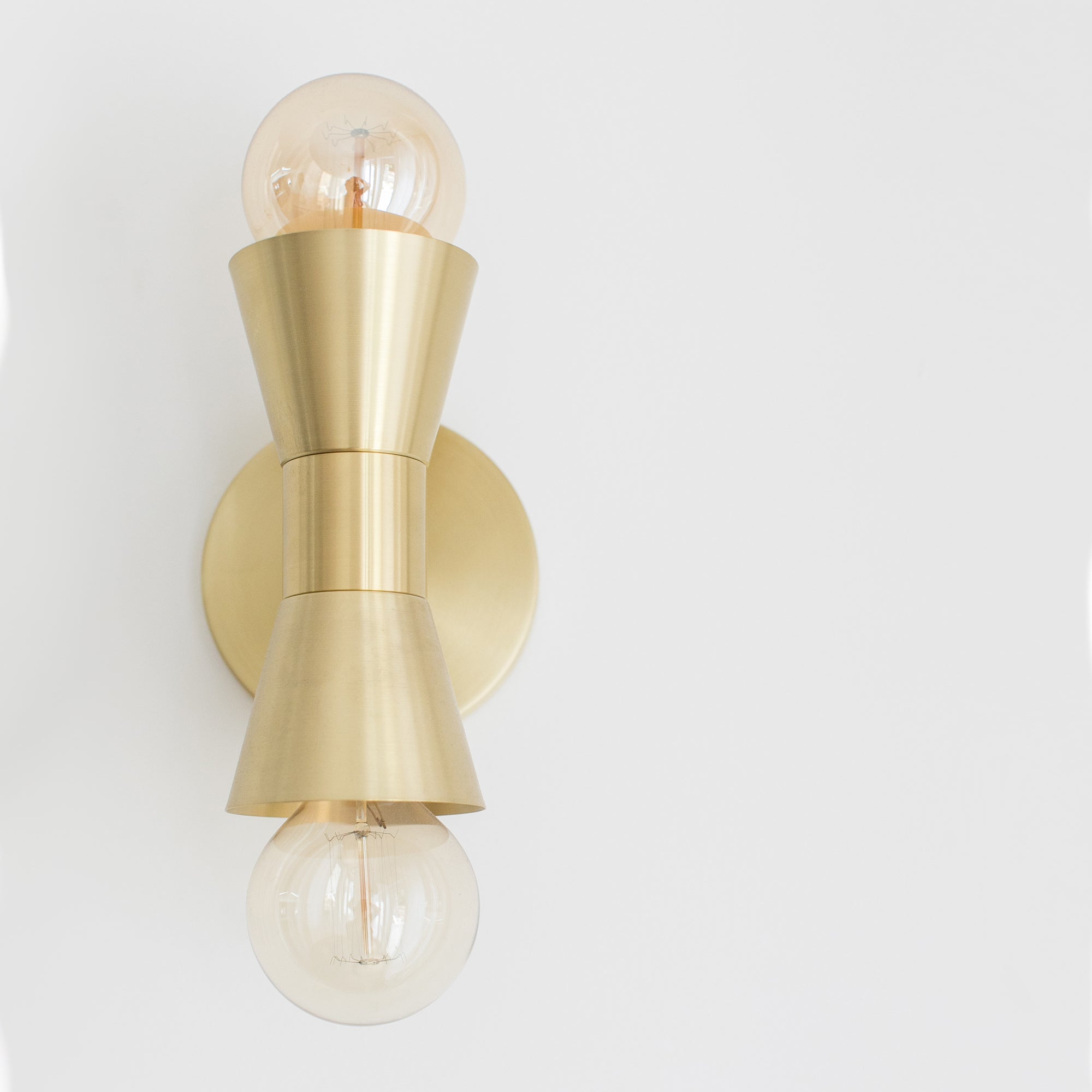 Mira shown in Brass. Interiors by Sarah Sherman Samuel for Sugar and Charm Studio