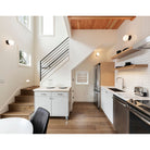 Moss 6" Sconce shown in Matte Black. Interior Design by Teal Davison Design