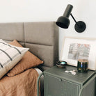 Scout Single Articulated shown in Matte Black with Graphite Patina Accents. Interior design by Krystle Wahnschaffe