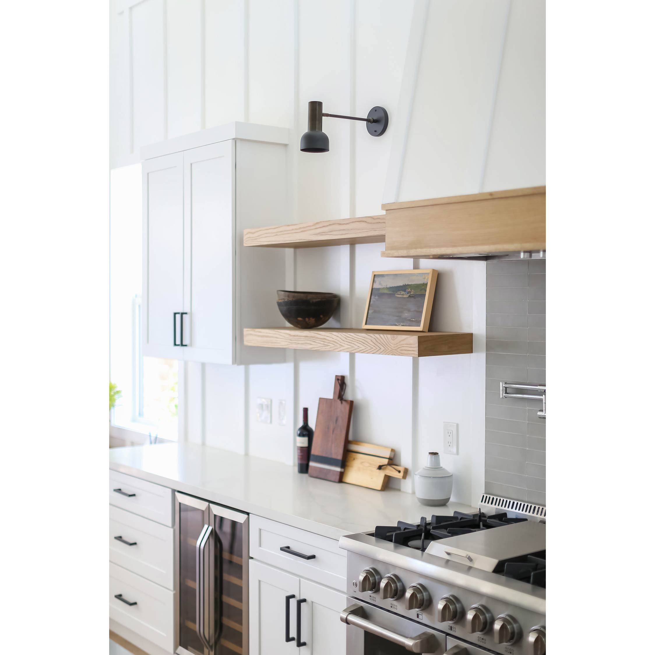 Scout Single Articulated shown in Matte Black with Graphite Patina Accents. Interior Design by Brooke Wagner. Photo by Ryan Garvin