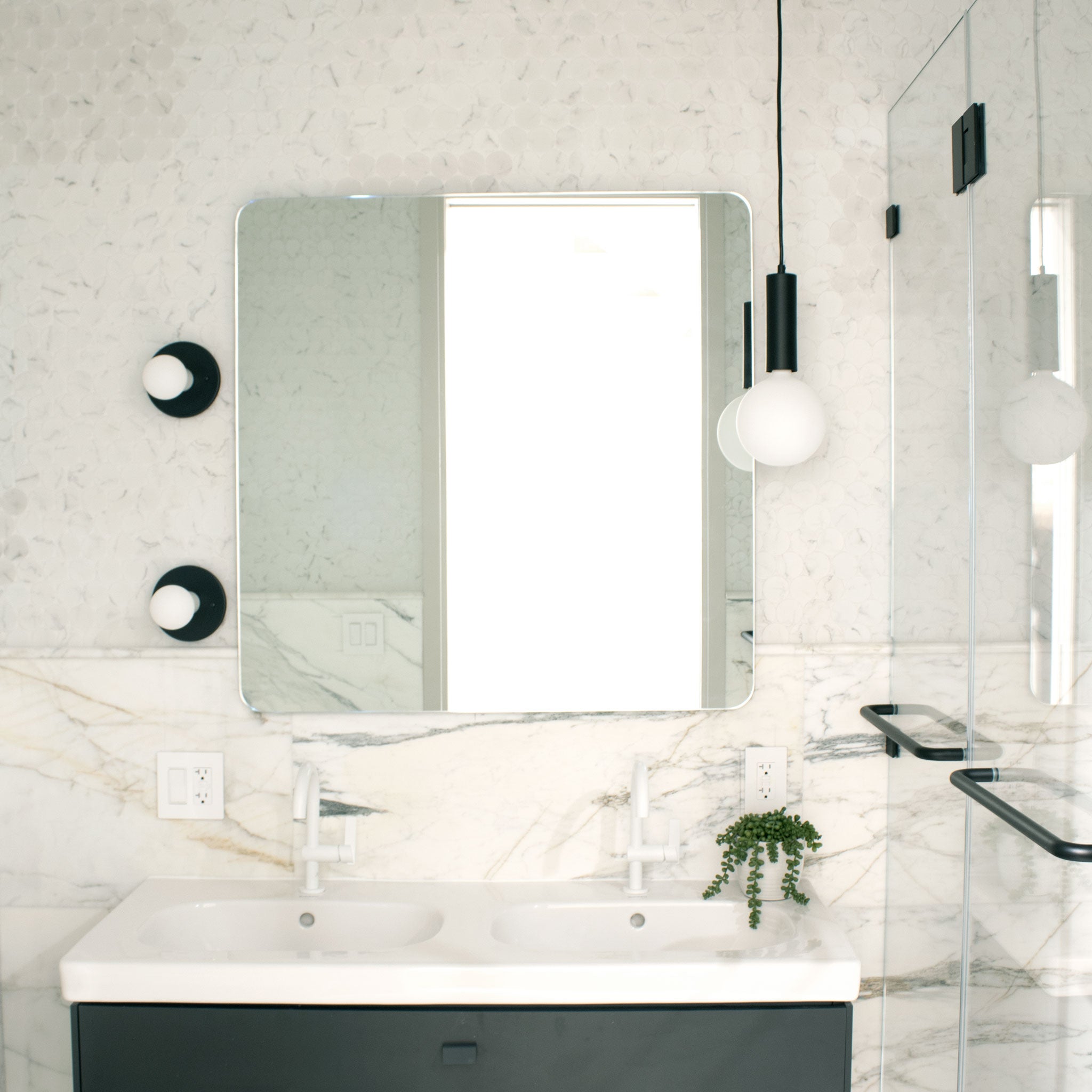 Swift shown with an Eclipse Black Glaze Ceramic canopy and Bone Ceramic socket cup