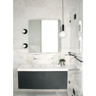 Fjord Cord Pendant shown in Matte Black with Black Cloth Cord. Swift Sconces shown in Matte Black