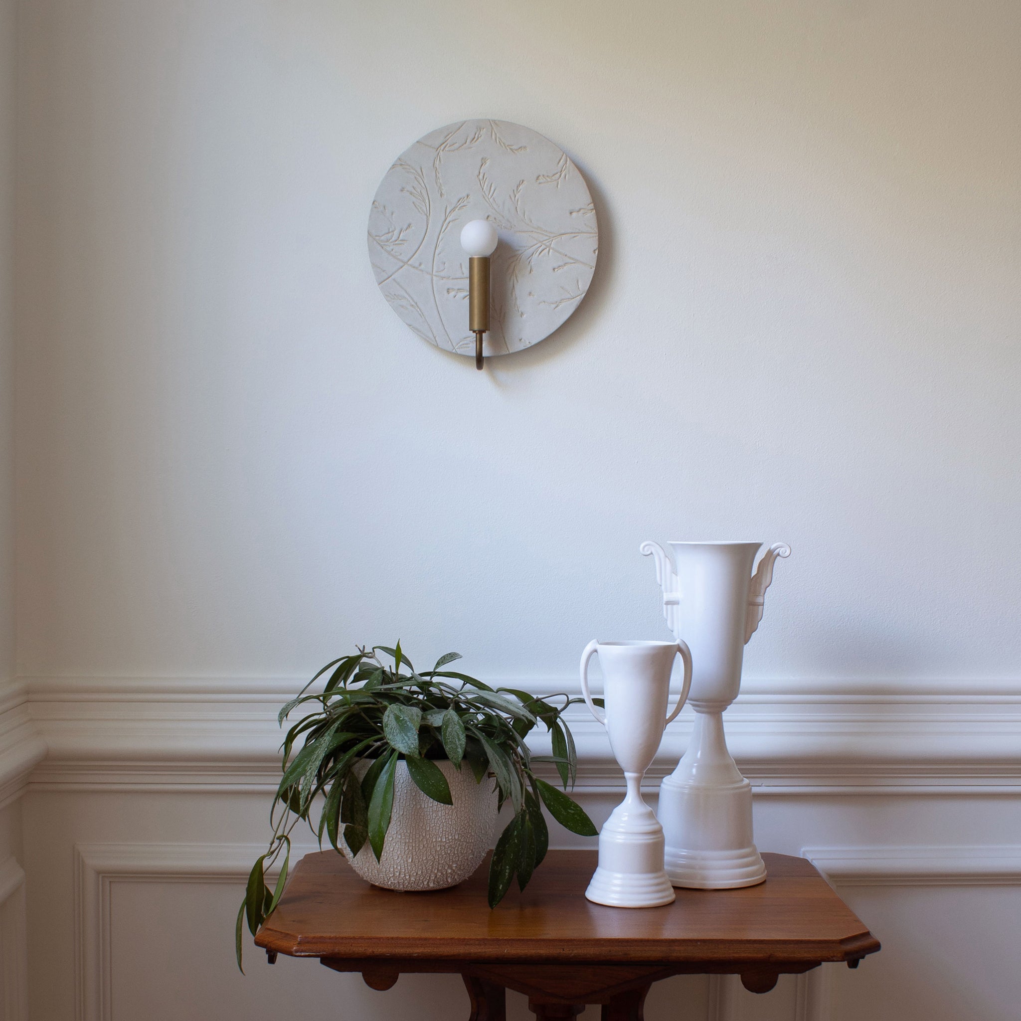 Tanglewood ADA shown in Heirloom Brass with a Natural White Tanglewood Ceramic 