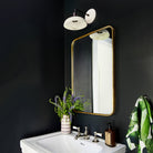 Terra Sconce in Bone with matte black, Interior Design by Zoe Feldman Design, Photography by Stacy Zarin Goldberg