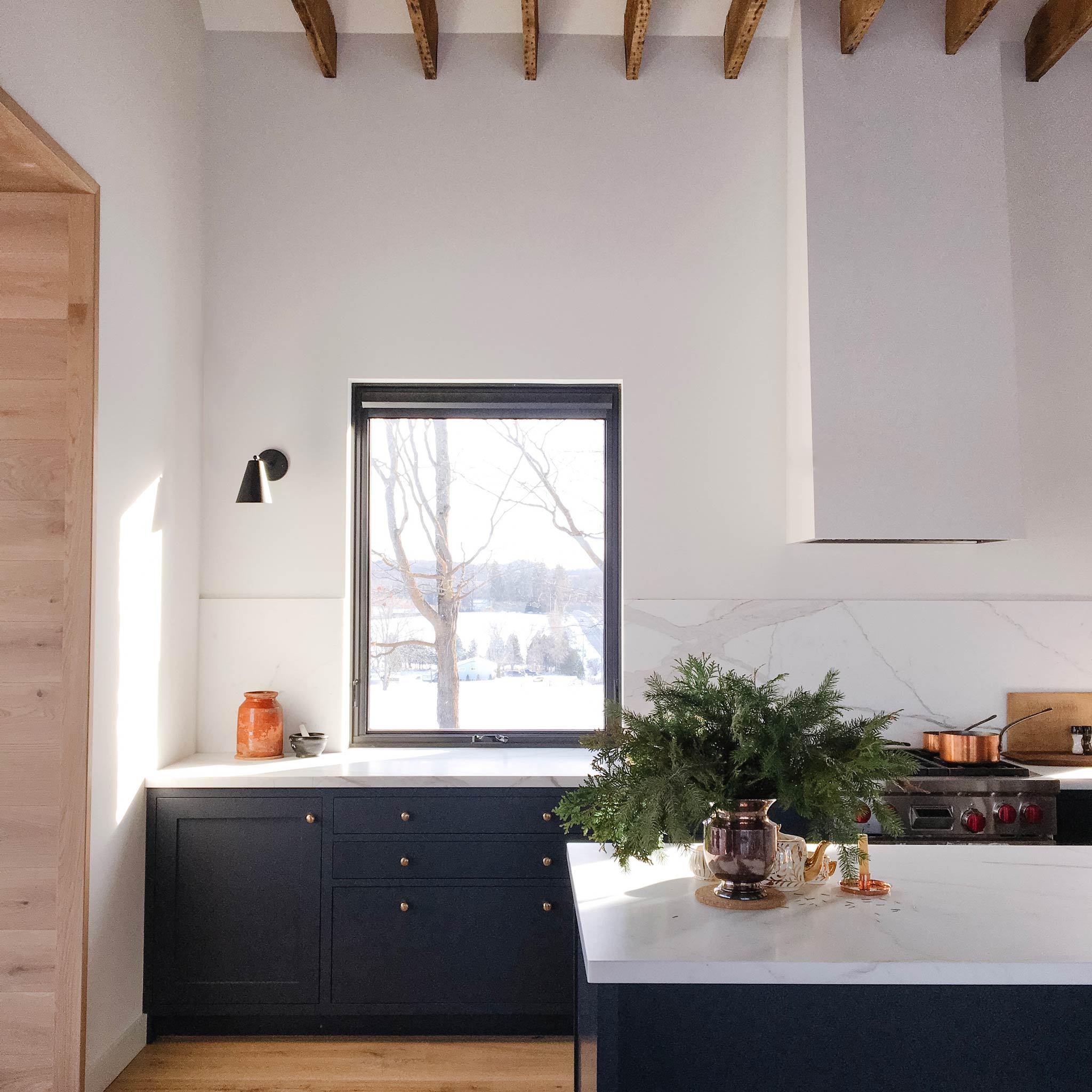 Tilt Cone with Wood Canopy shown in Matte Black. Photo by @SchoolhouseGrey