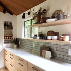 Tilt Cone shown in Matte Black. Interior design by Kelsey Sikkema