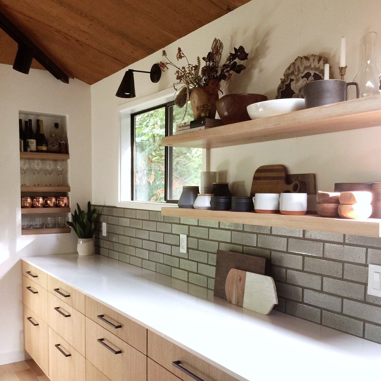 Tilt Cone shown in Matte Black. Interior design by Kelsey Sikkema