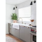 Tilt Cone shown in Matte Black and Brass finish with a 6" arm. Interior design by Sarah Sherman Samuel for Sugar and Charm Studio