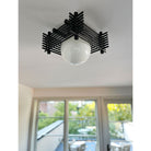 Yugen Surface shown in Black Stained wood finish with Matte Black and Half Size