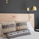 Amélie Sconce 8" shown in Brass with a Black Twisted Cloth Cord. Interior Design by Erin Barrett of Sunwoven. Photo by Margeret Wright.