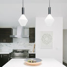 Aurora Pendant shown in Matte Black. Interior Design by Heidi Callier Design