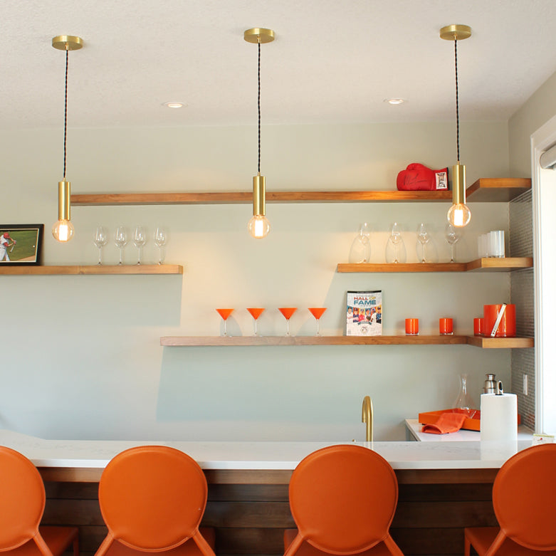 Fjord Cord Pendant shown in Brass with Black Vinyl Cord. The Serenity House by Westlake Development Group #streetofdreamspdx