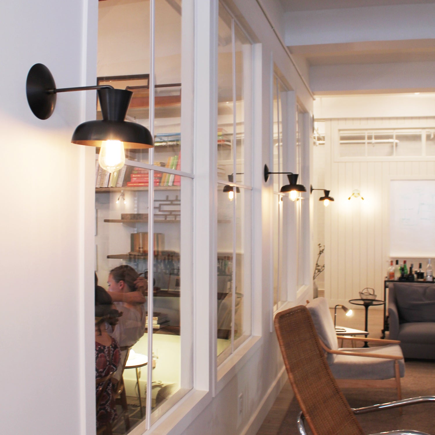 Isle Sconces shown in Matte Black. Interior Design by B Sherman Workshop