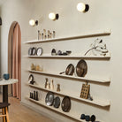 Moss 6" Sconce shown in Matte Black. Interior Design by Brad Sherman of Float Studio. Photo by Rocky Luten