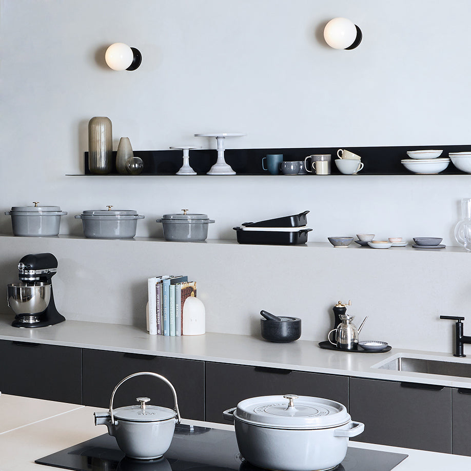 Moss 6" Sconce shown in Matte Black. Interior Design by Brad Sherman of Float Studio. Photo by Rocky Luten